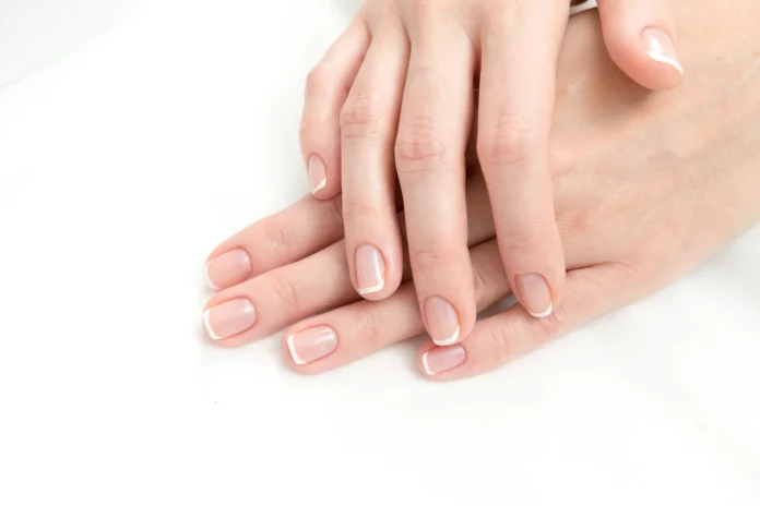 Opt for some short French tip nails to add class to your look