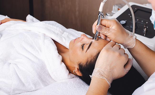 Bride getting pre-wedding facial treatment